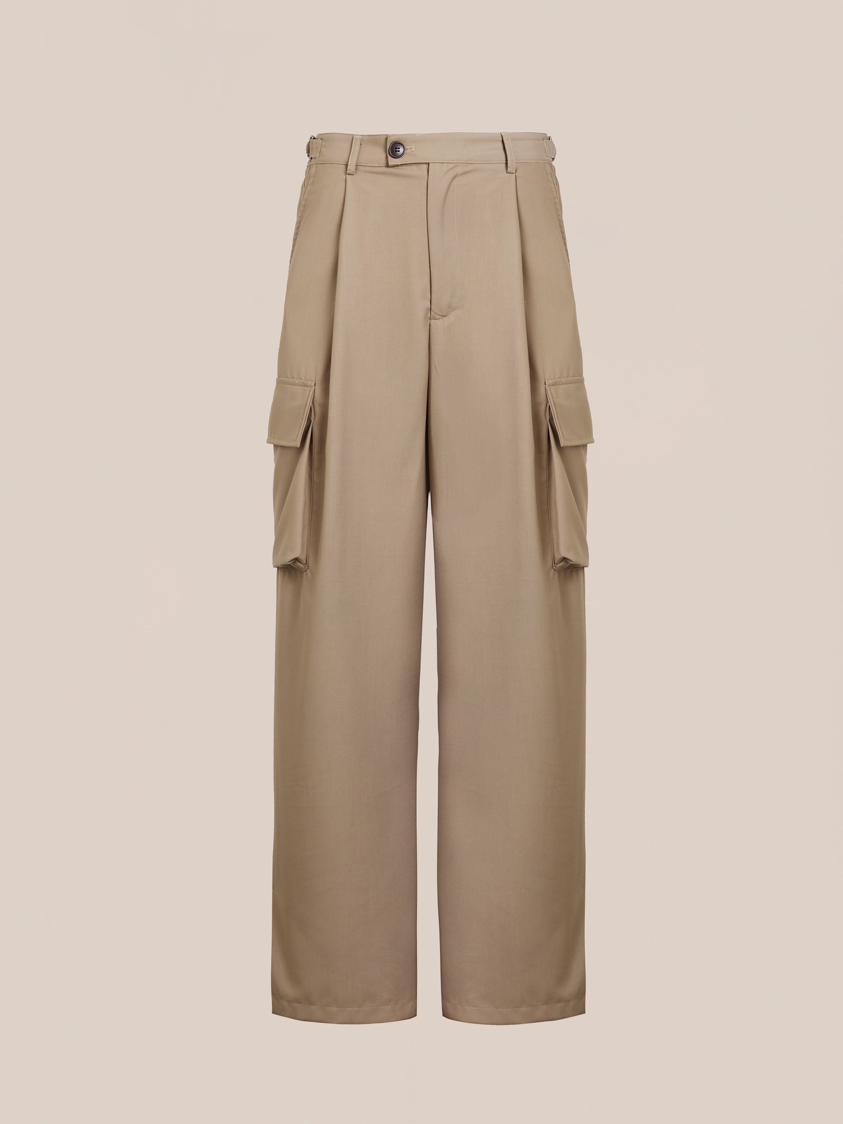 FOUND's Hava Pleated Cargo Trousers offer a utilitarian style with beige wide-legs, button and zip closure, large side pockets, and an adjustable waistband.