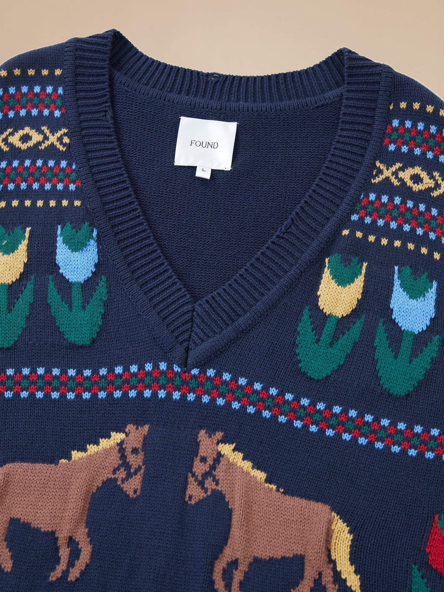 A Found Isle Horse Reverie Sweater Knit Vest with horses on it.