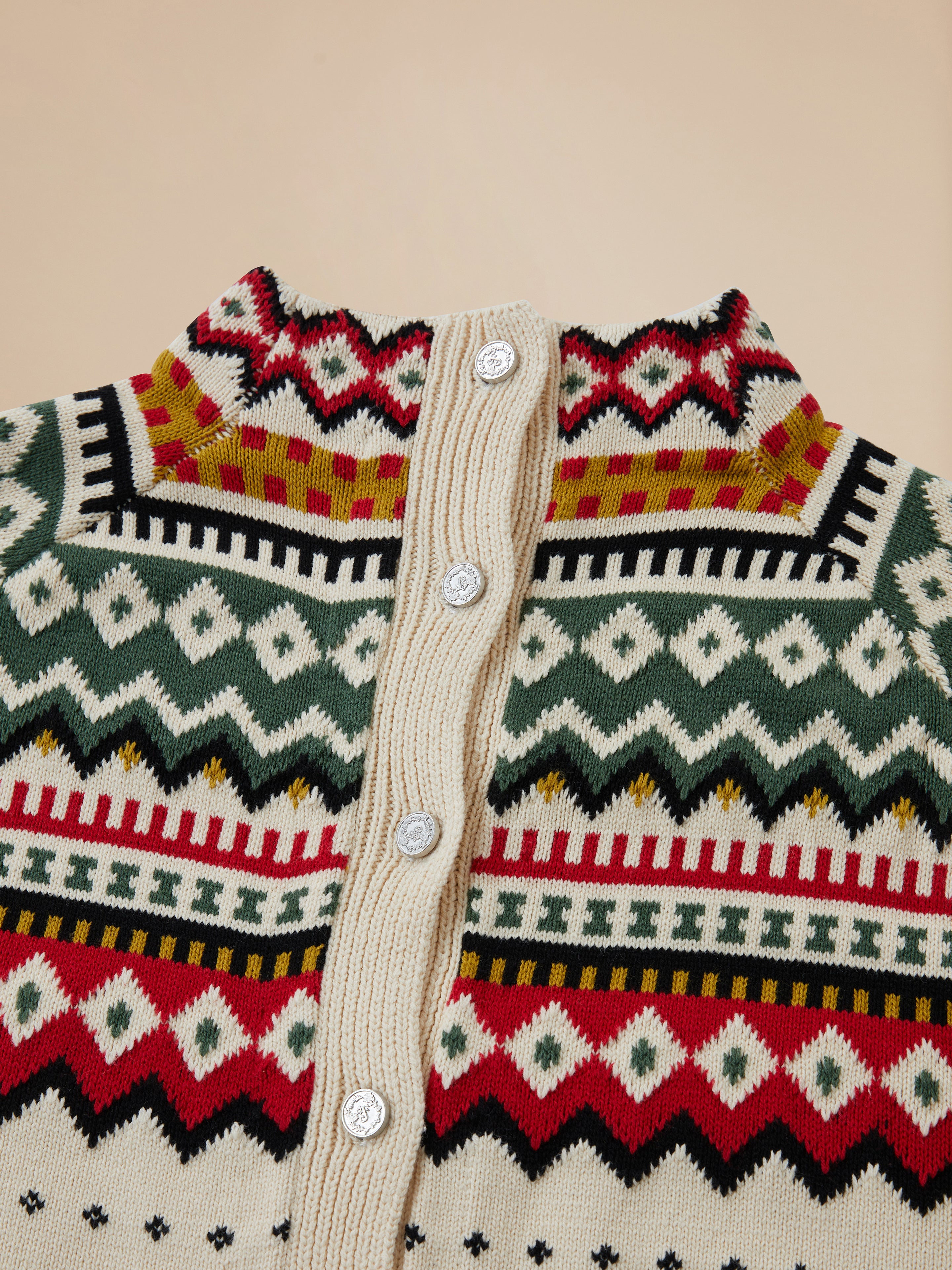 A pre-ordered Found Harwan Isles Sweater showcasing a colorful pattern inspired by the Scottish Fair Isle region.