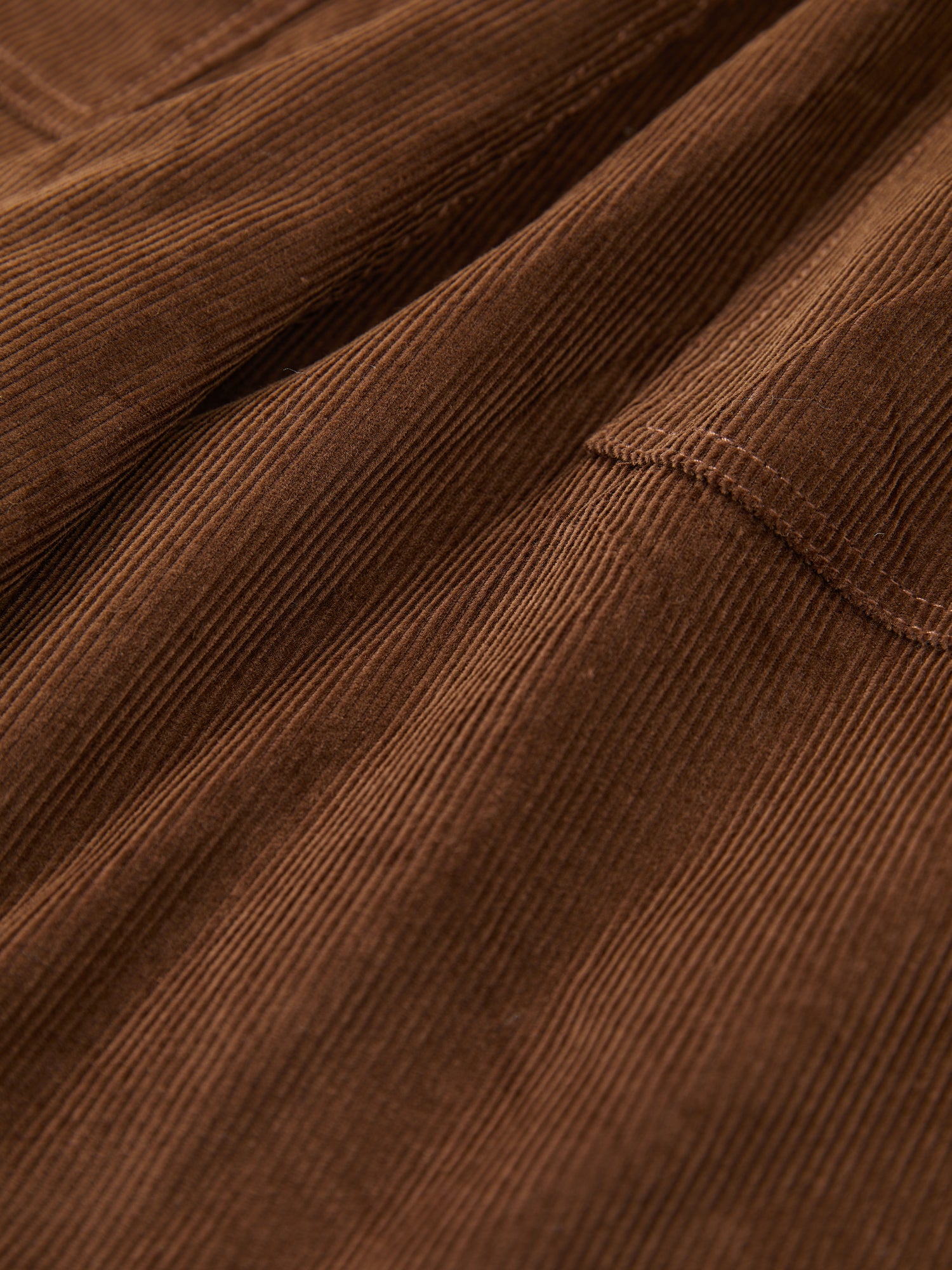 A close up image of a Found Canoe Multi Patch Corduroy Shorts jacket.