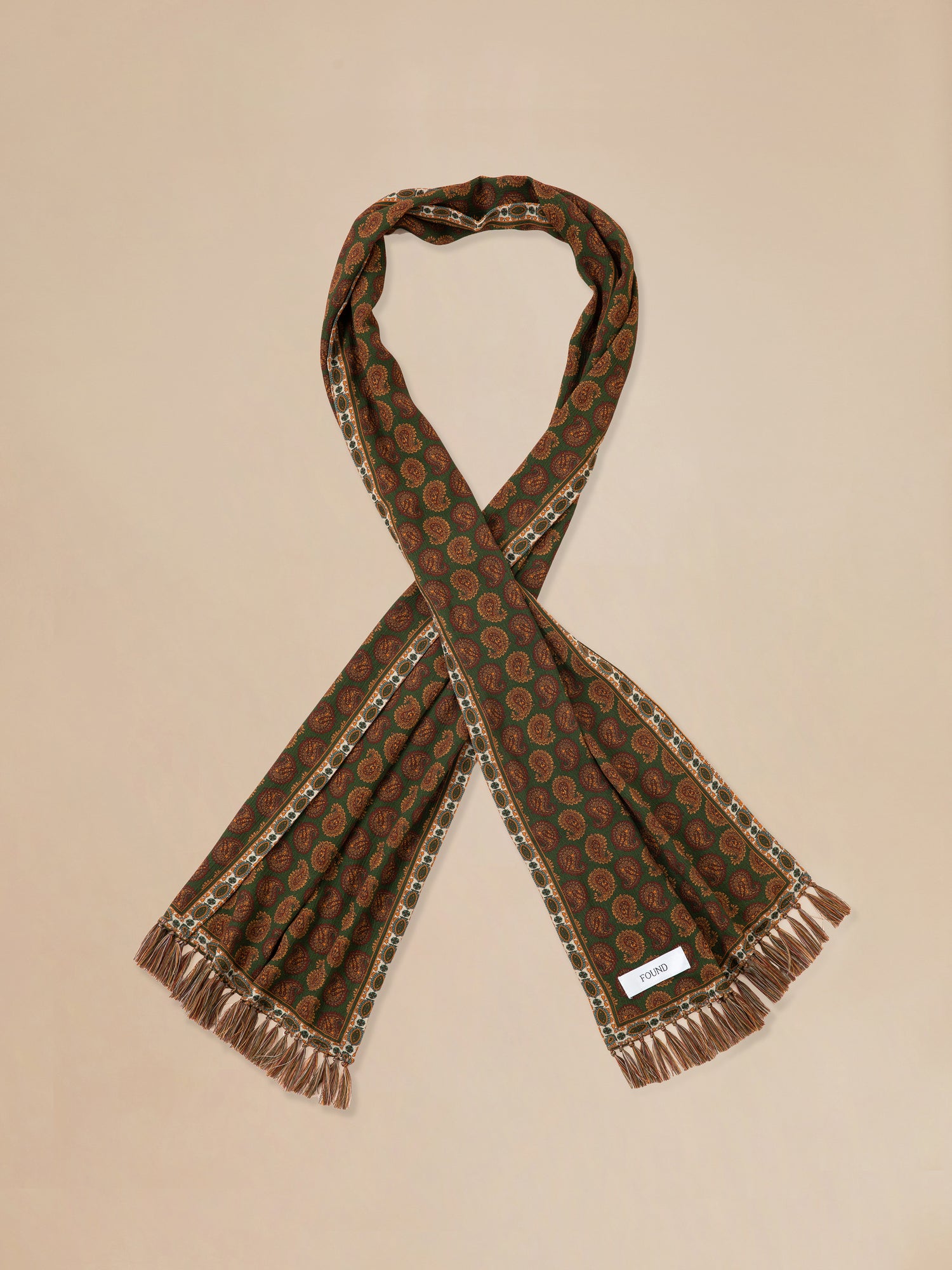 A Found Paisley Forest Scarf with hand-tied tassels.