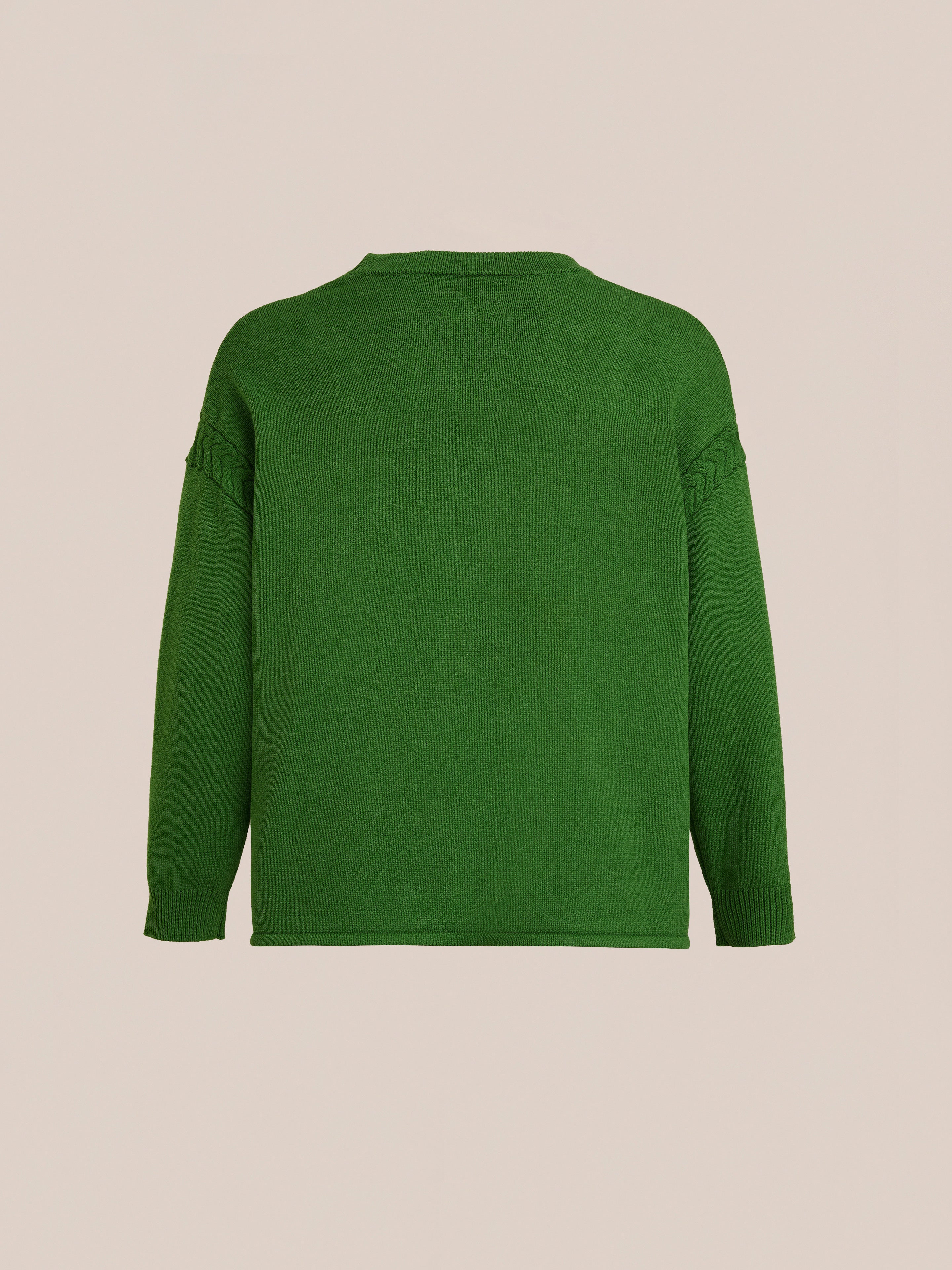The FOUND Paisley Knit Cardigan, a green long-sleeve sweater inspired by South Asian textile patterns, is shown from the back against a beige background.