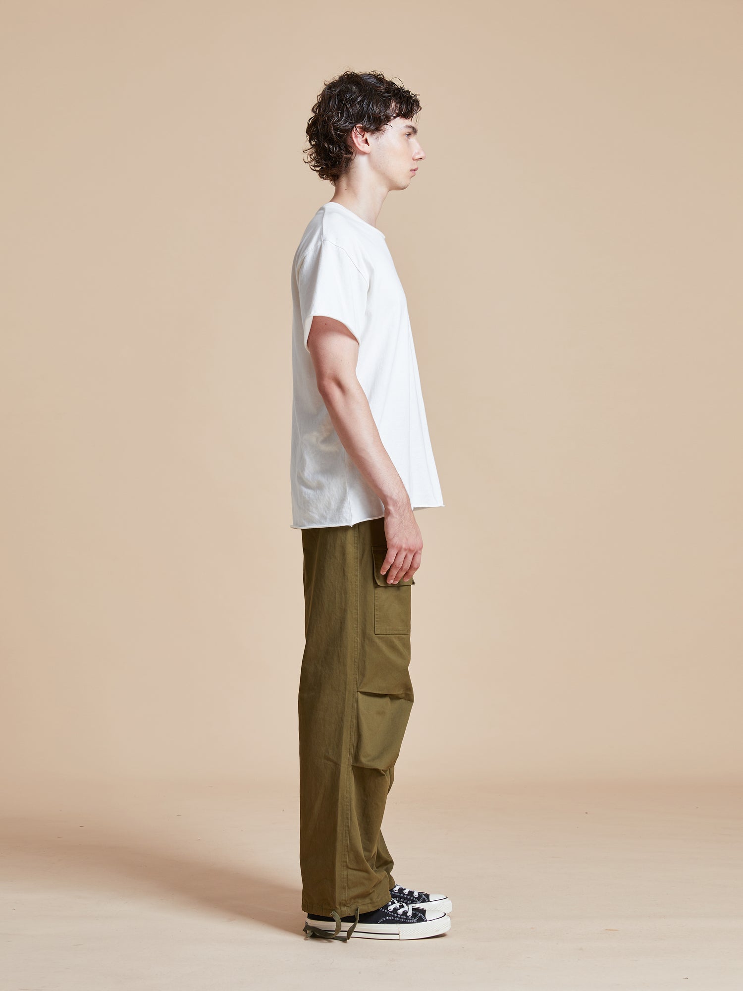 https://found.store/cdn/shop/files/Parachute-Cargo-Twill-Pants-in-Olive-by-Found-FW-23-2.jpg?v=1700707990&width=1500