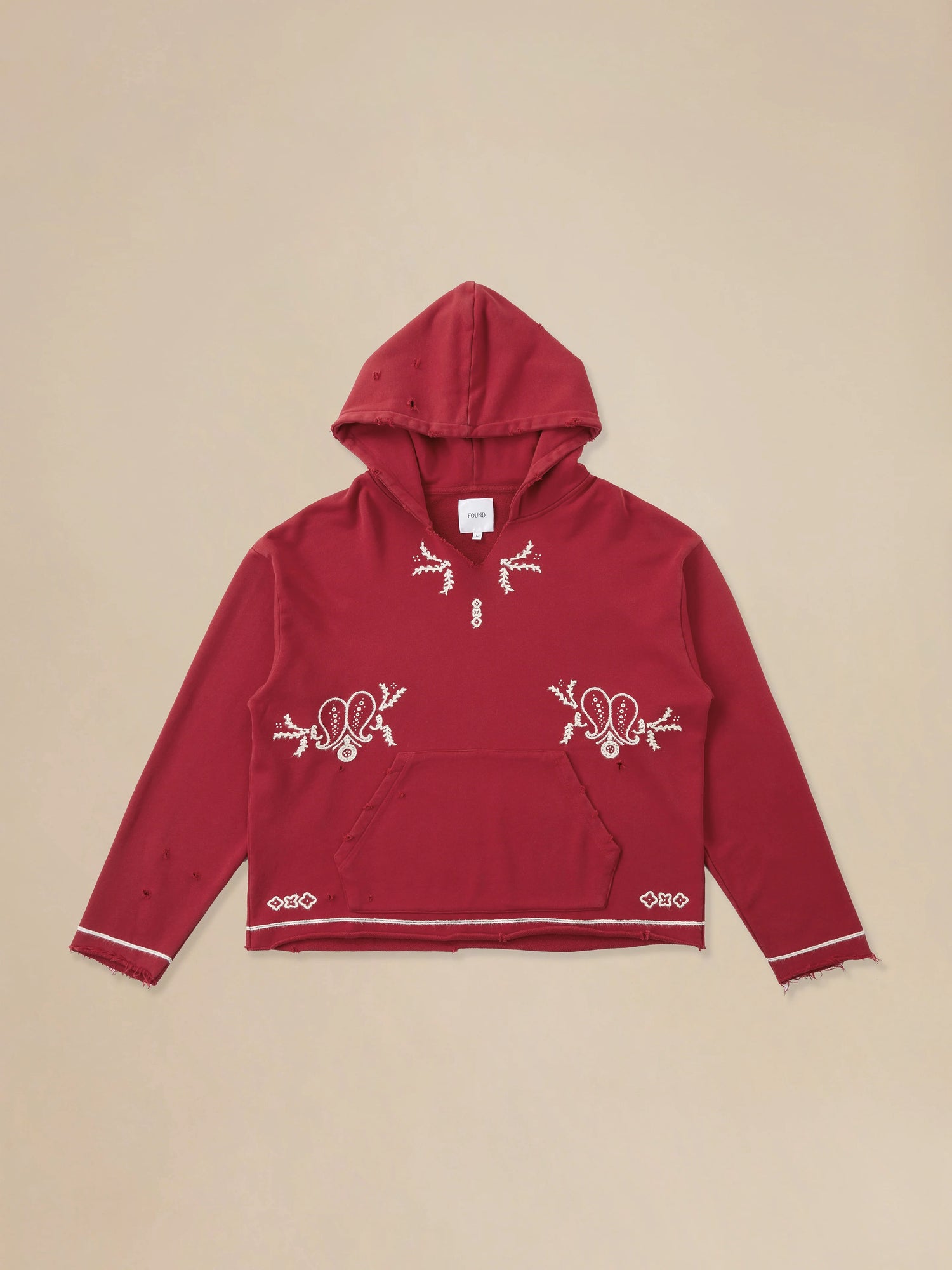 A Found Phulkari Embroidered Hoodie in red, inspired by the artistry of the Punjab region.