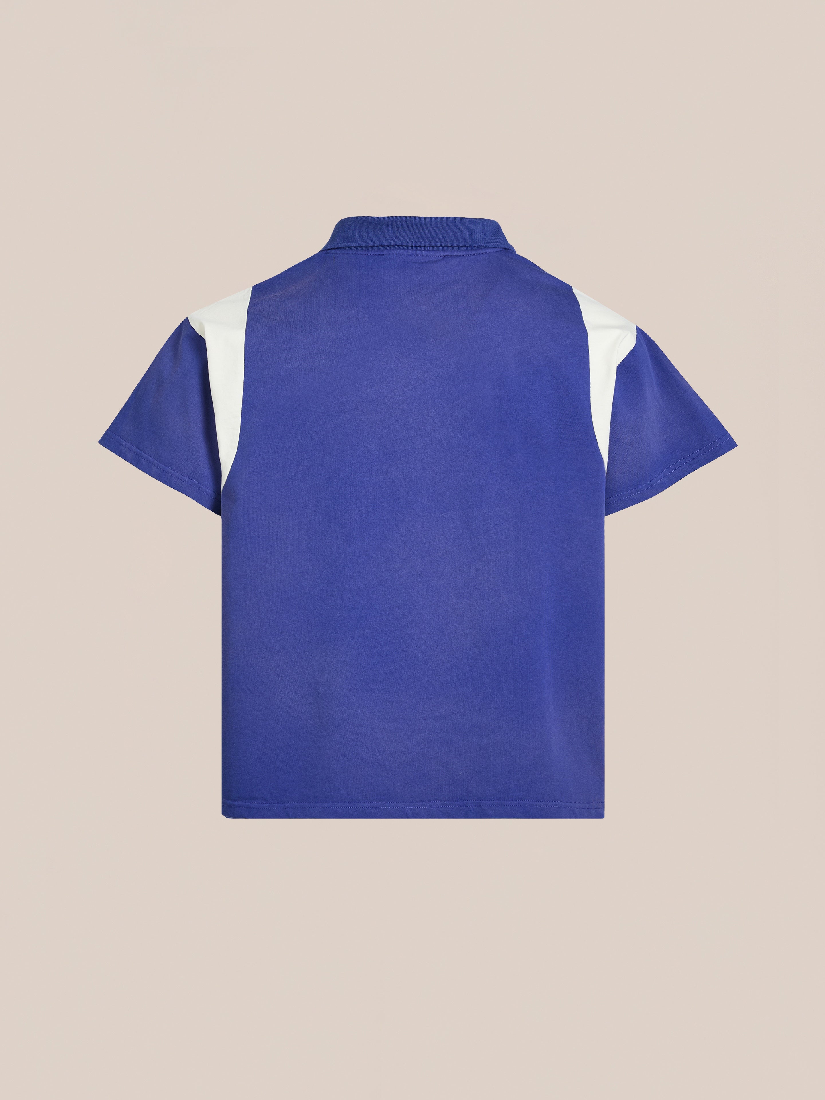 A blue Premier League Jersey by FOUND, featuring white shoulder panels in a vintage sportswear style, is displayed from the back against a neutral background.