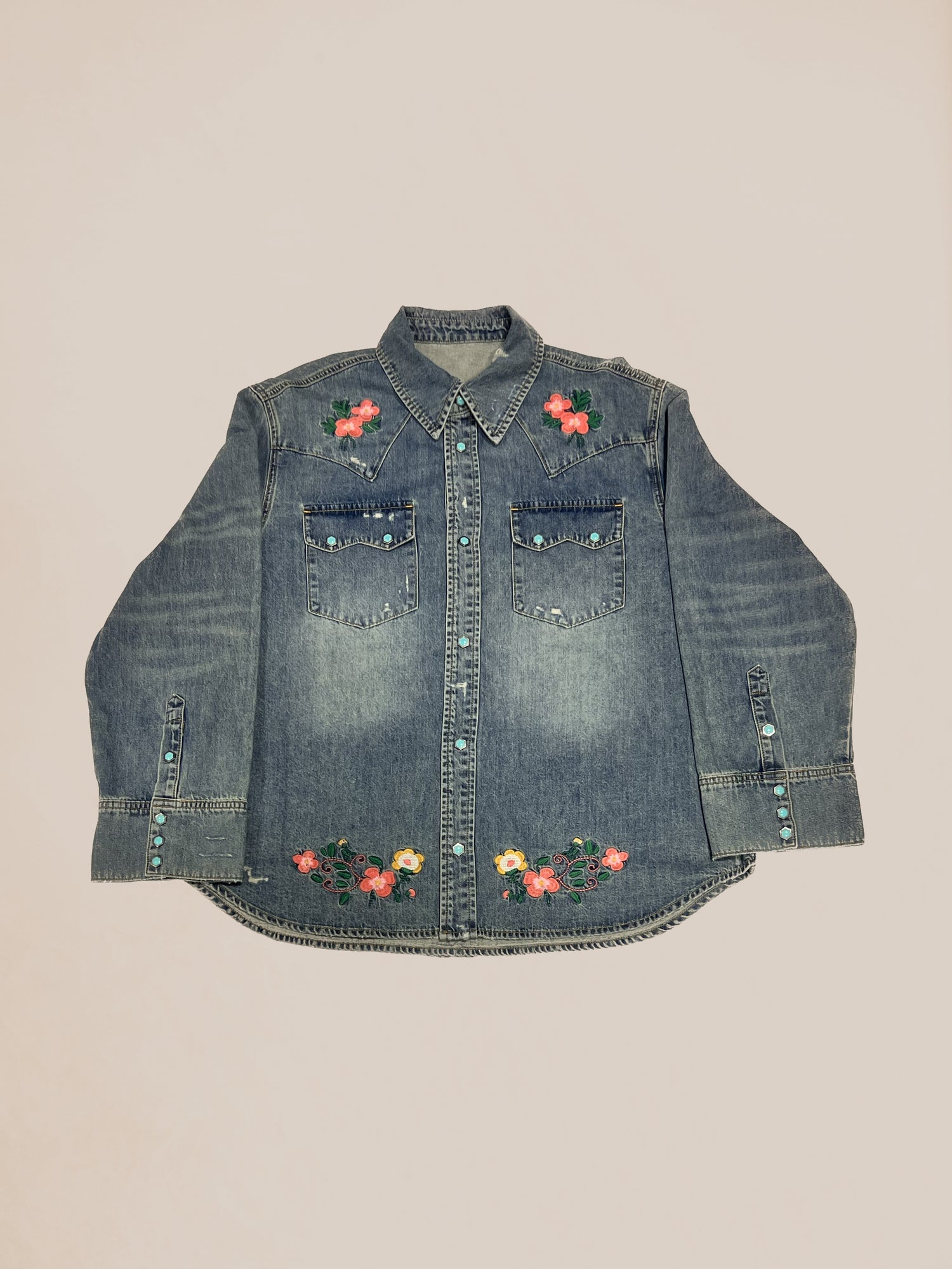 Denim jacket with Profound's Sample 17 Floral Embroidered Western Shirt design on a pale background.