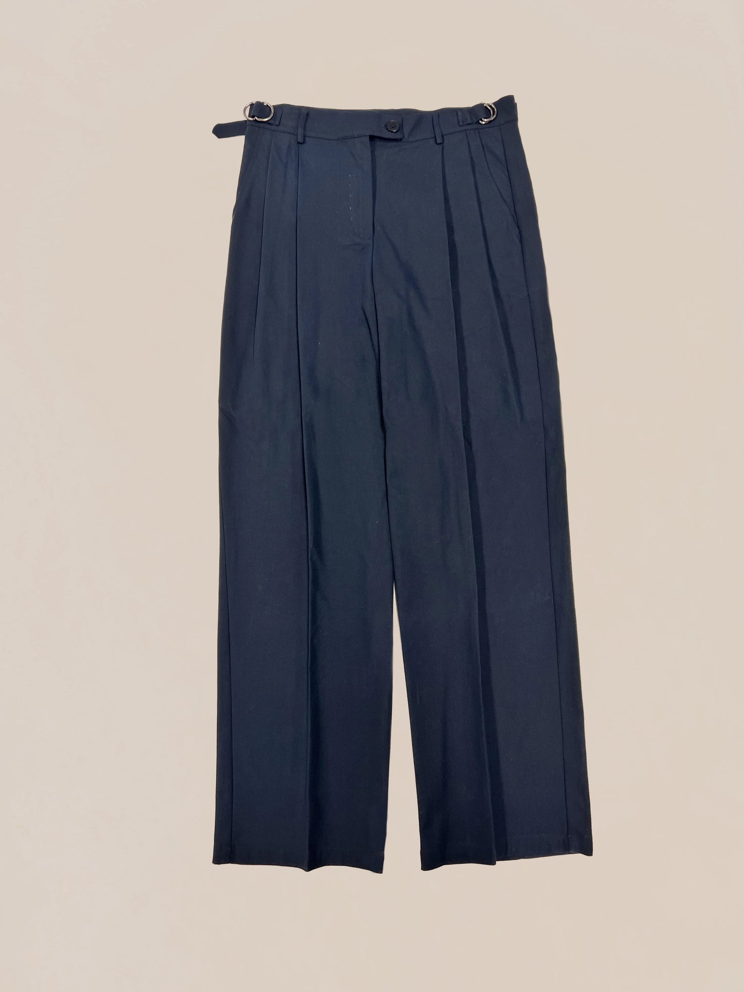 Profound's Sample 36 Navy pleated cotton trousers on a neutral background.