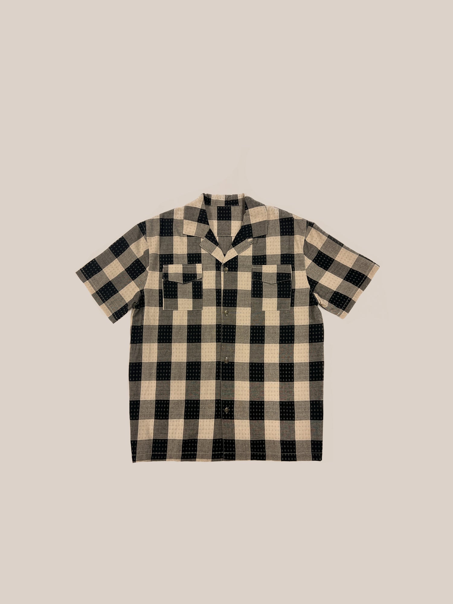 A Sample 57 (Gray Plaid Short Sleeve Camp Shirt) by Profound laid out flat on a light background.