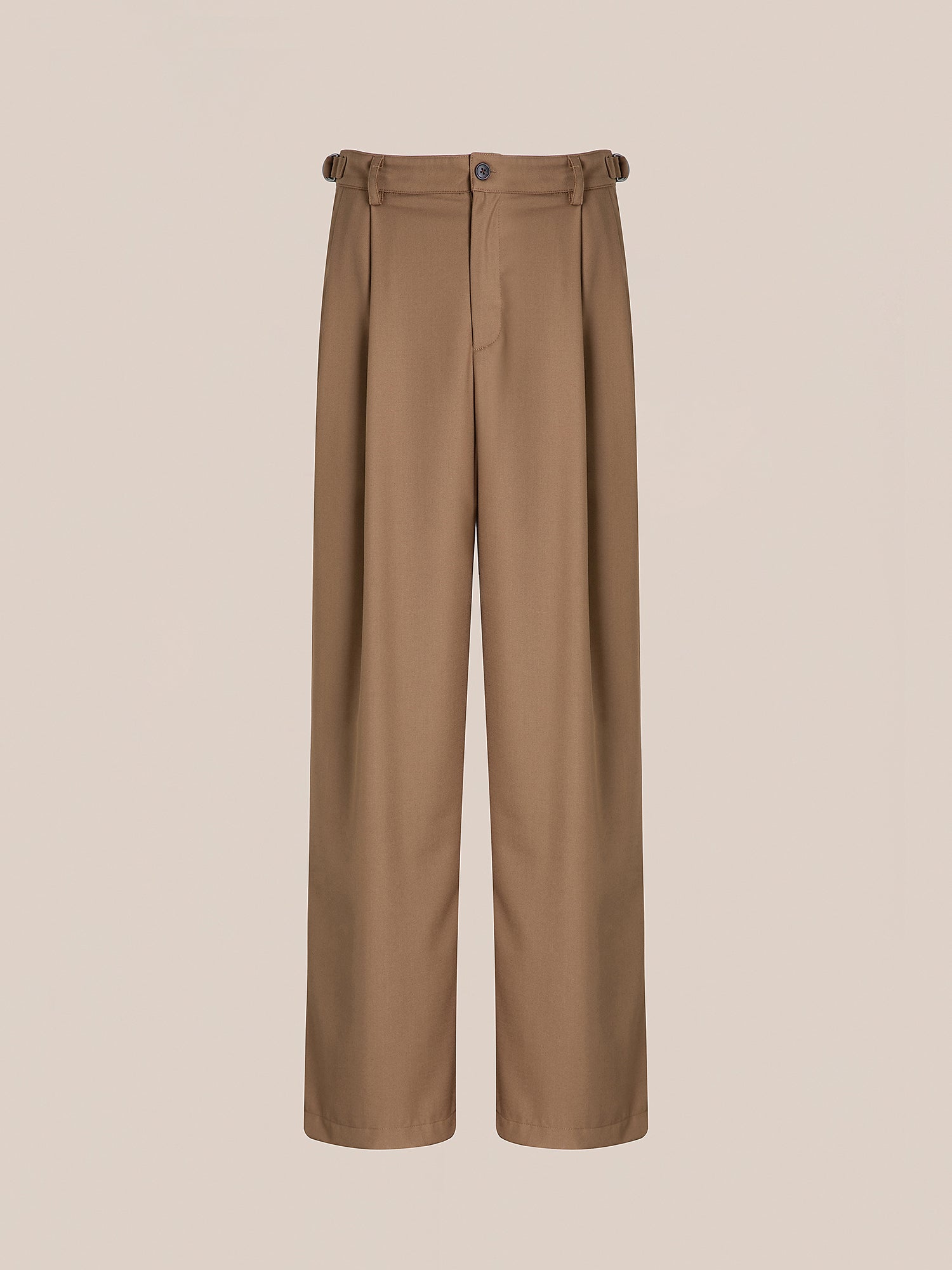 Pleated Trousers by FOUND in brown with a high-rise and wide-leg fit, featuring a button and zip fly along with waistband adjusters, showcased against a plain background.