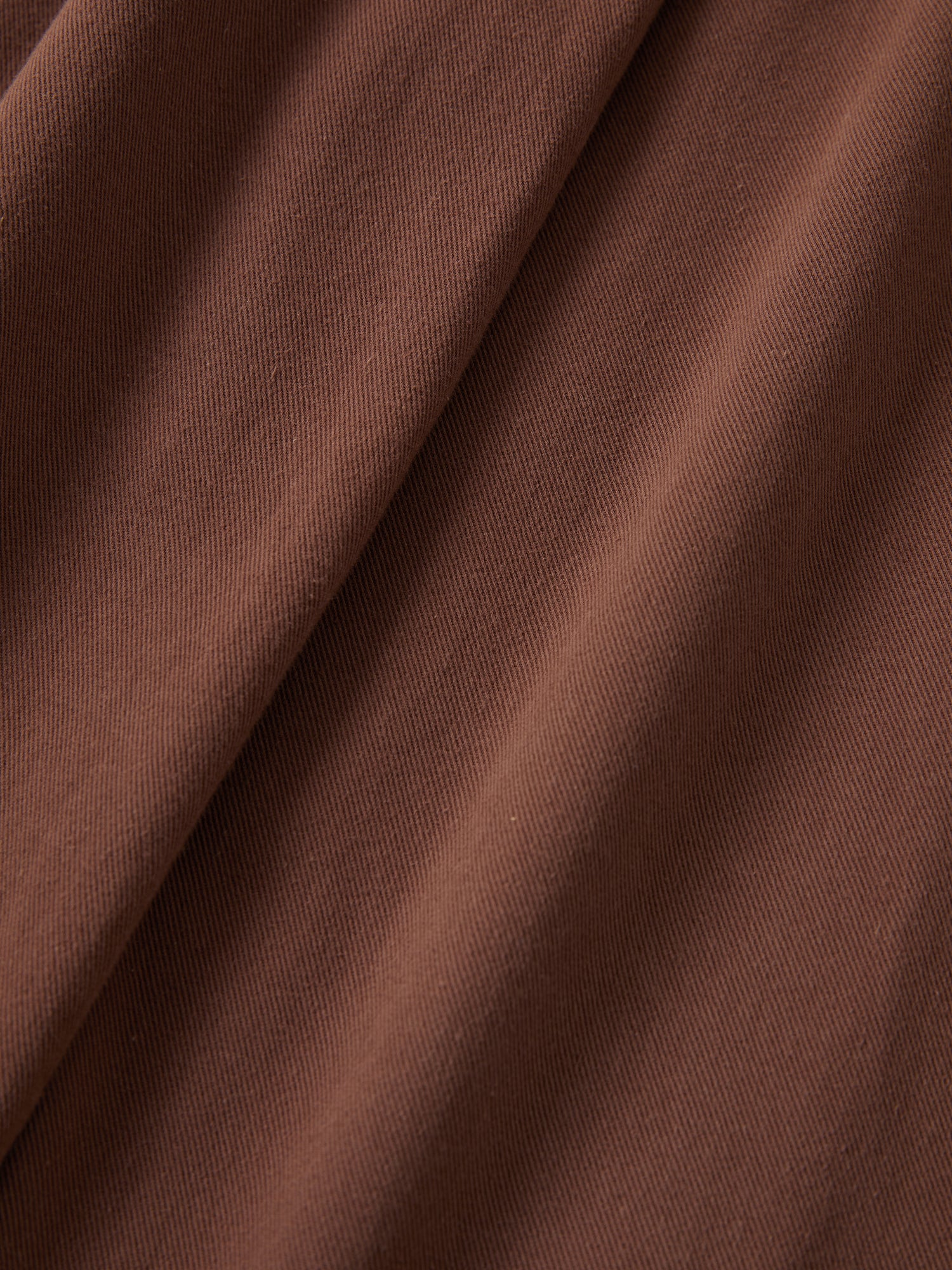 A close up of a Dusky Western Cargo Jeans fabric by Found.
