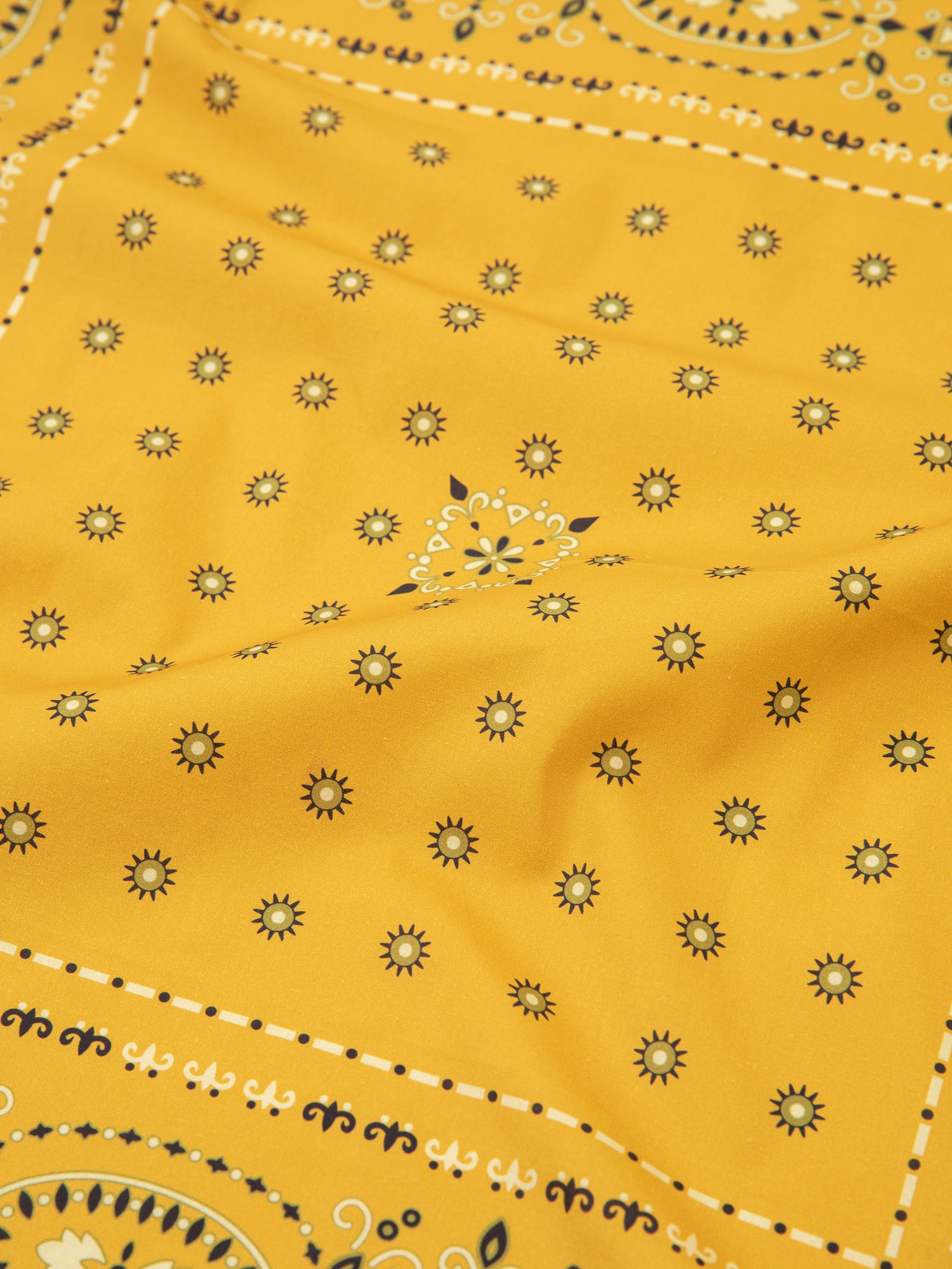 A Yellow Western bandana with airy cotton blend fabric by Found.