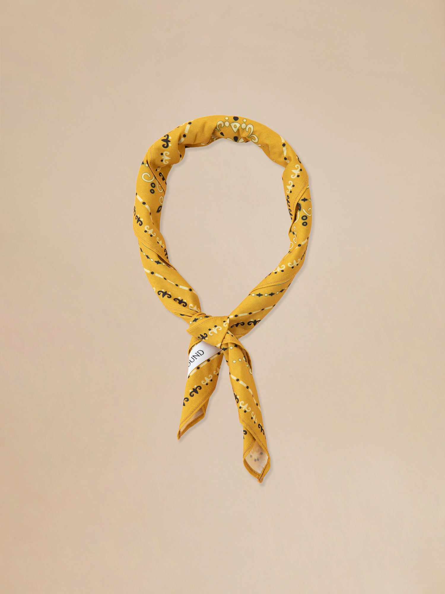 A classic Yellow Western Bandana silk scarf by Found.