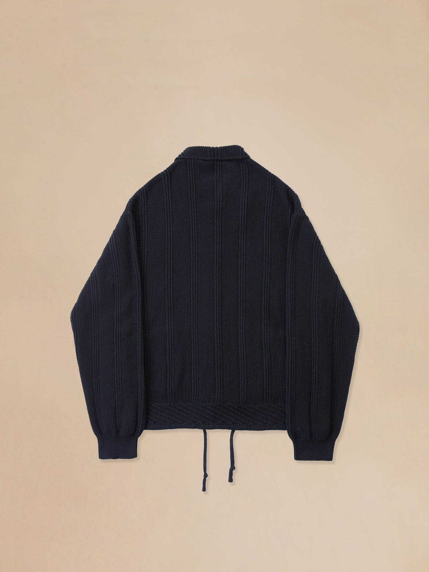 A Found Zip Up Panel Knit Ribbed Sweater on a beige background.