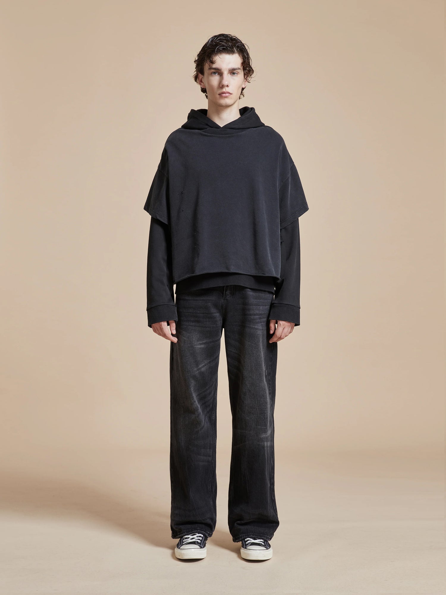 The model is wearing a Found Double Layer Hoodie in black.