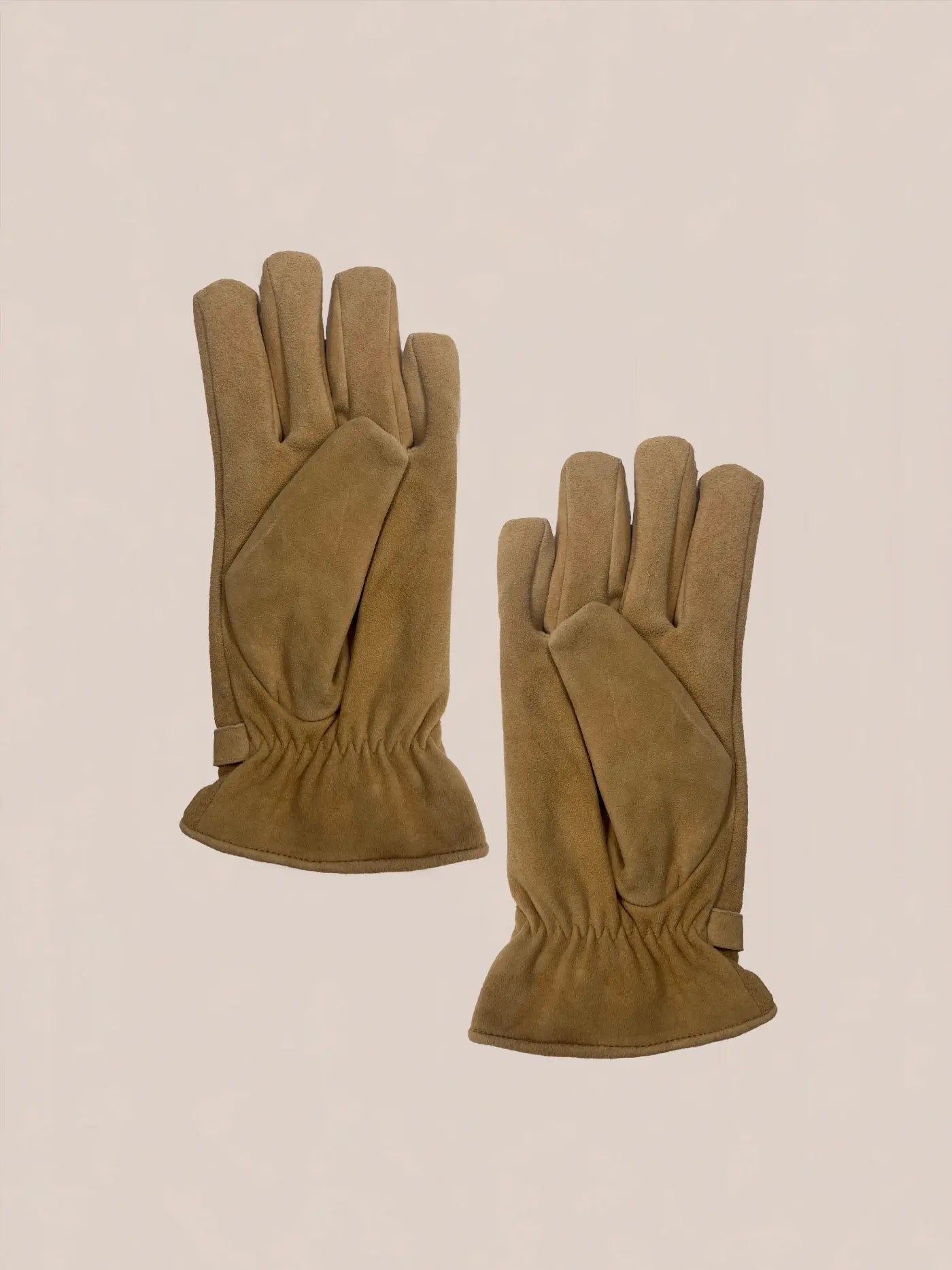 A pair of FOUND Suede Western Gloves in genuine brown suede with gathered cuffs is laid flat against a plain background.