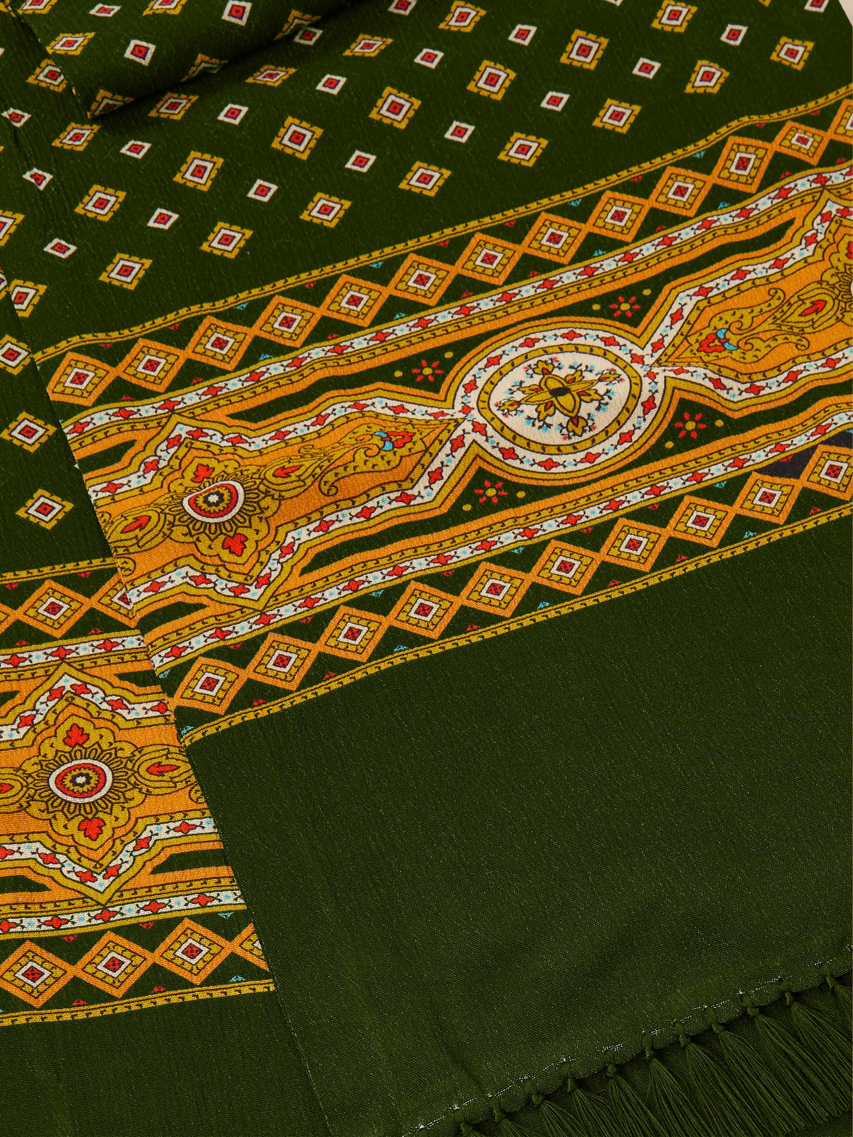 A Greener Pastures Scarf with an ornate pattern by Found.