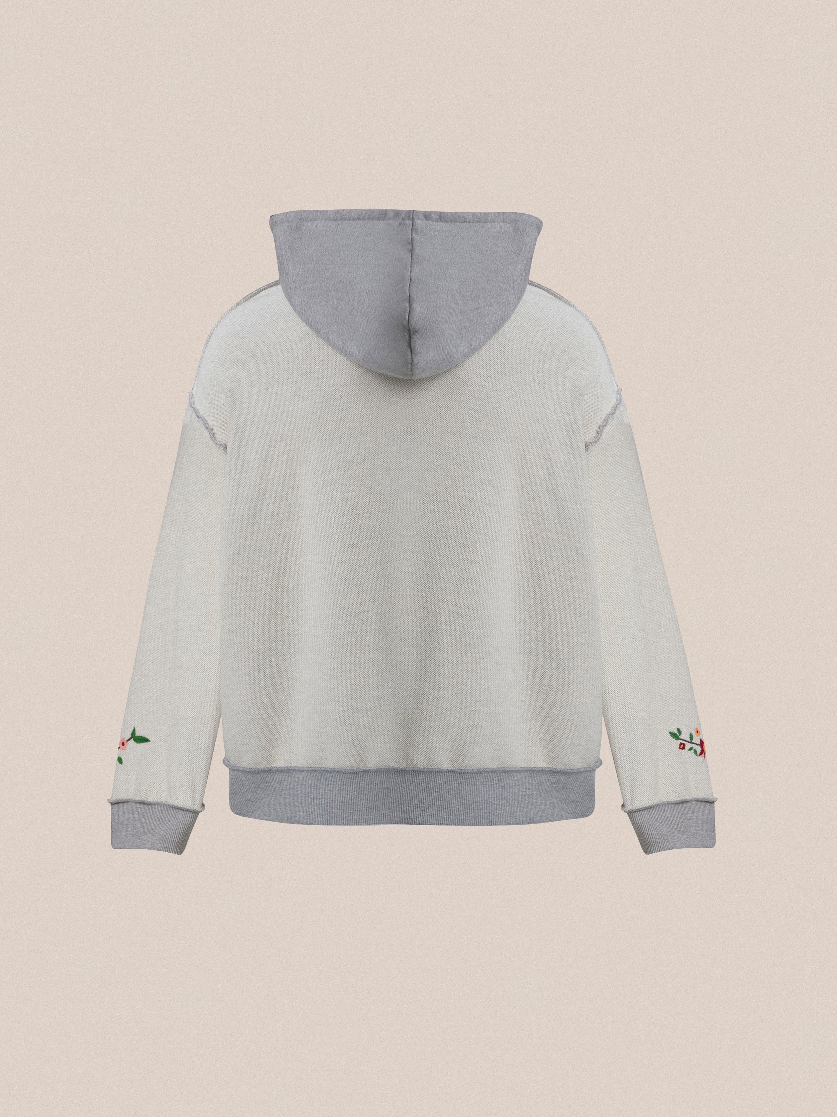 A child's Found Inverse Flower Petal Hoodie with embroidered details, crafted from French terry fabric.