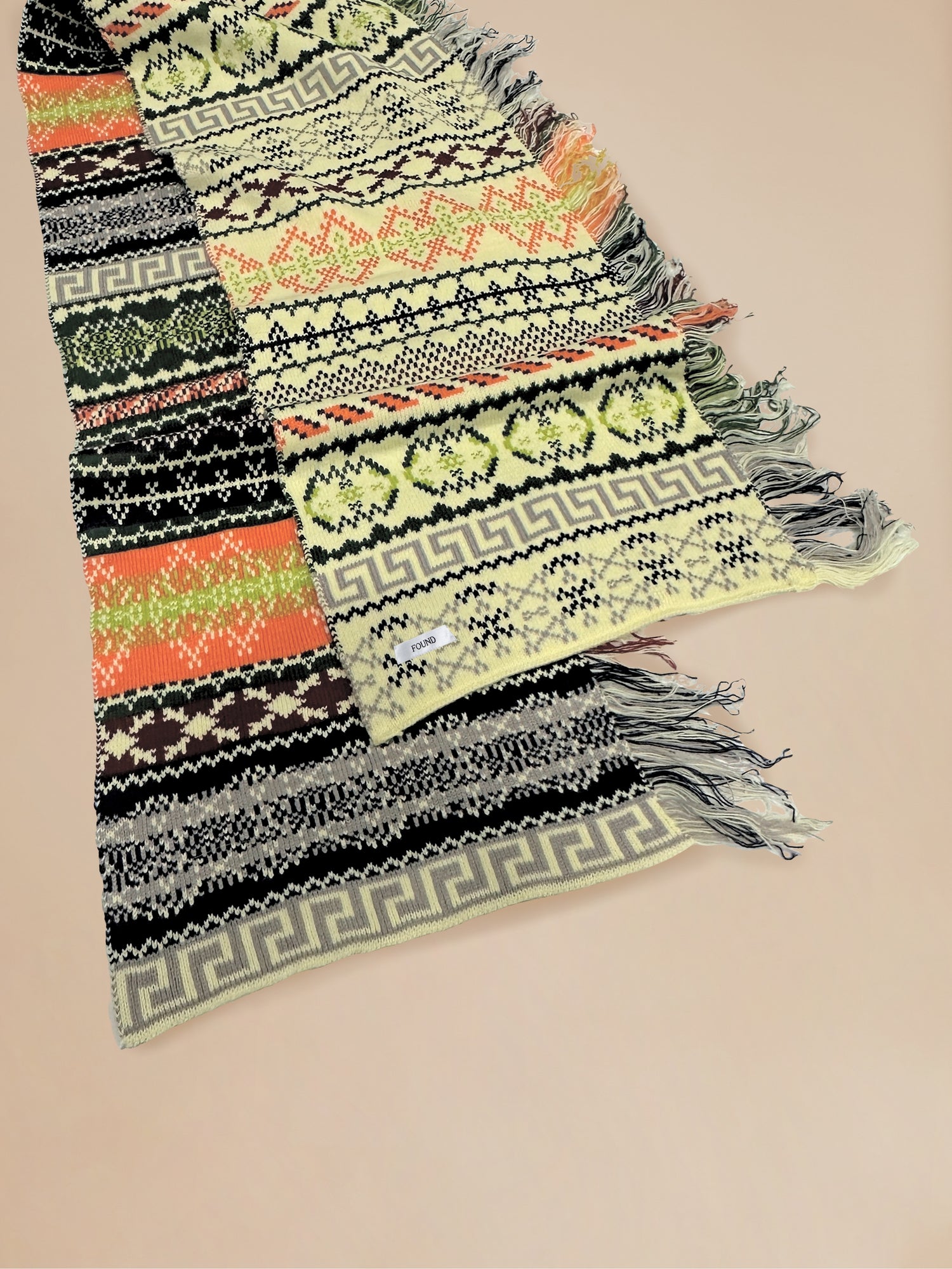 A Found Isles Scarf with fringes on it, available for pre-order.