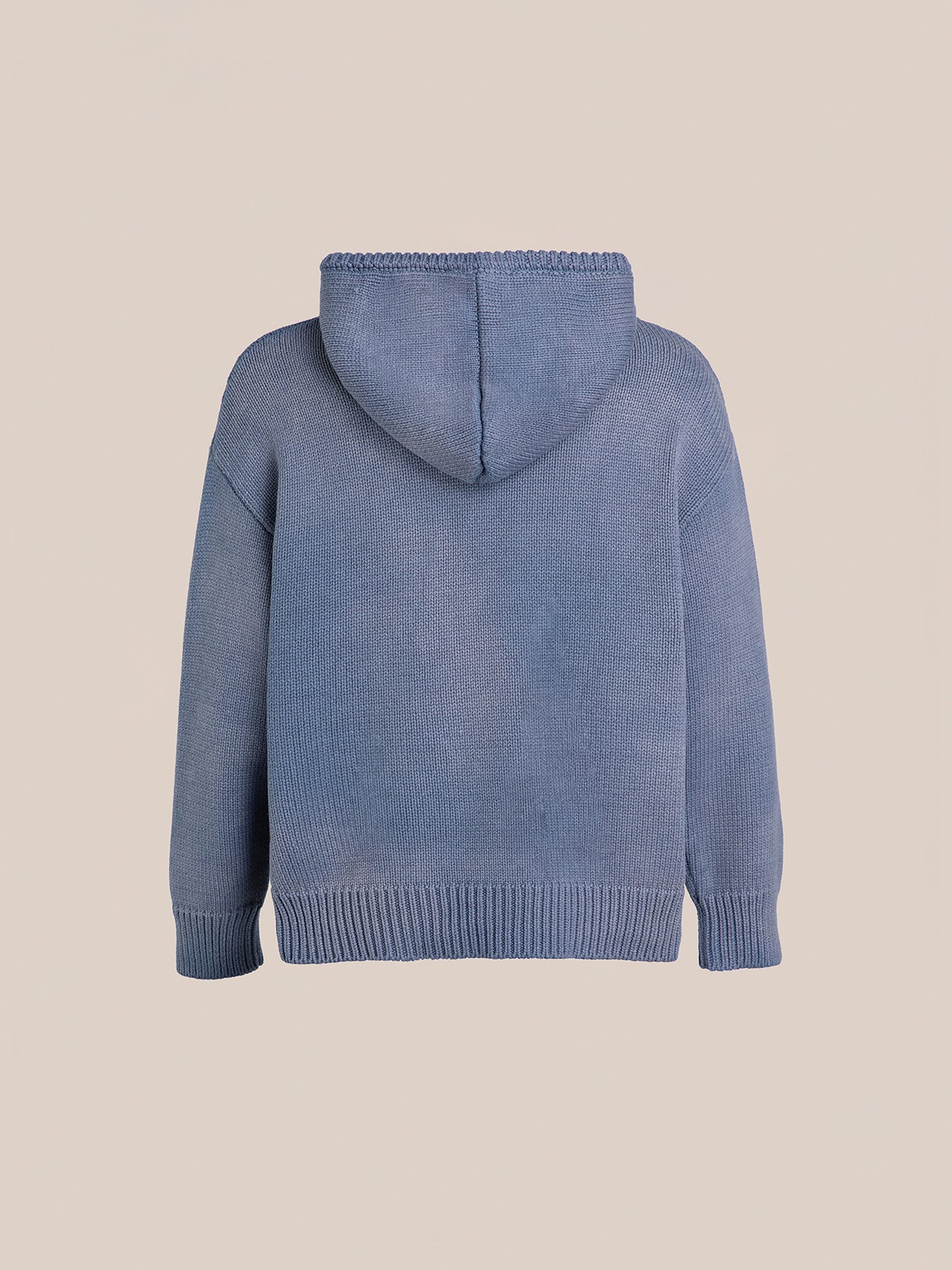 The Faded Knit Pocket Hoodie by FOUND, made from 100% cotton, is shown in a blue faded color from the back on a plain background.