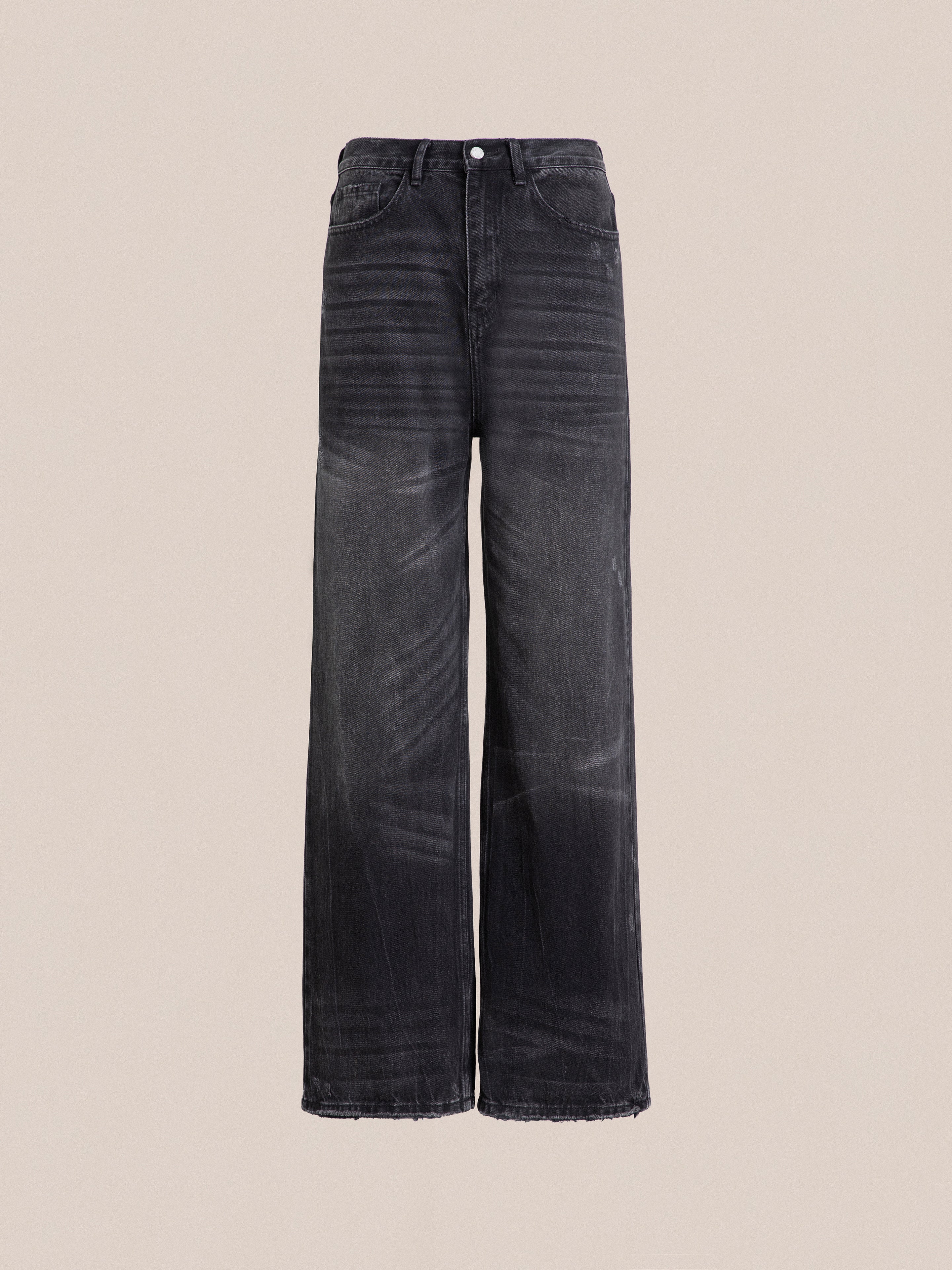 A pair of Lacy Baggy Jeans in black wash denim by Found.