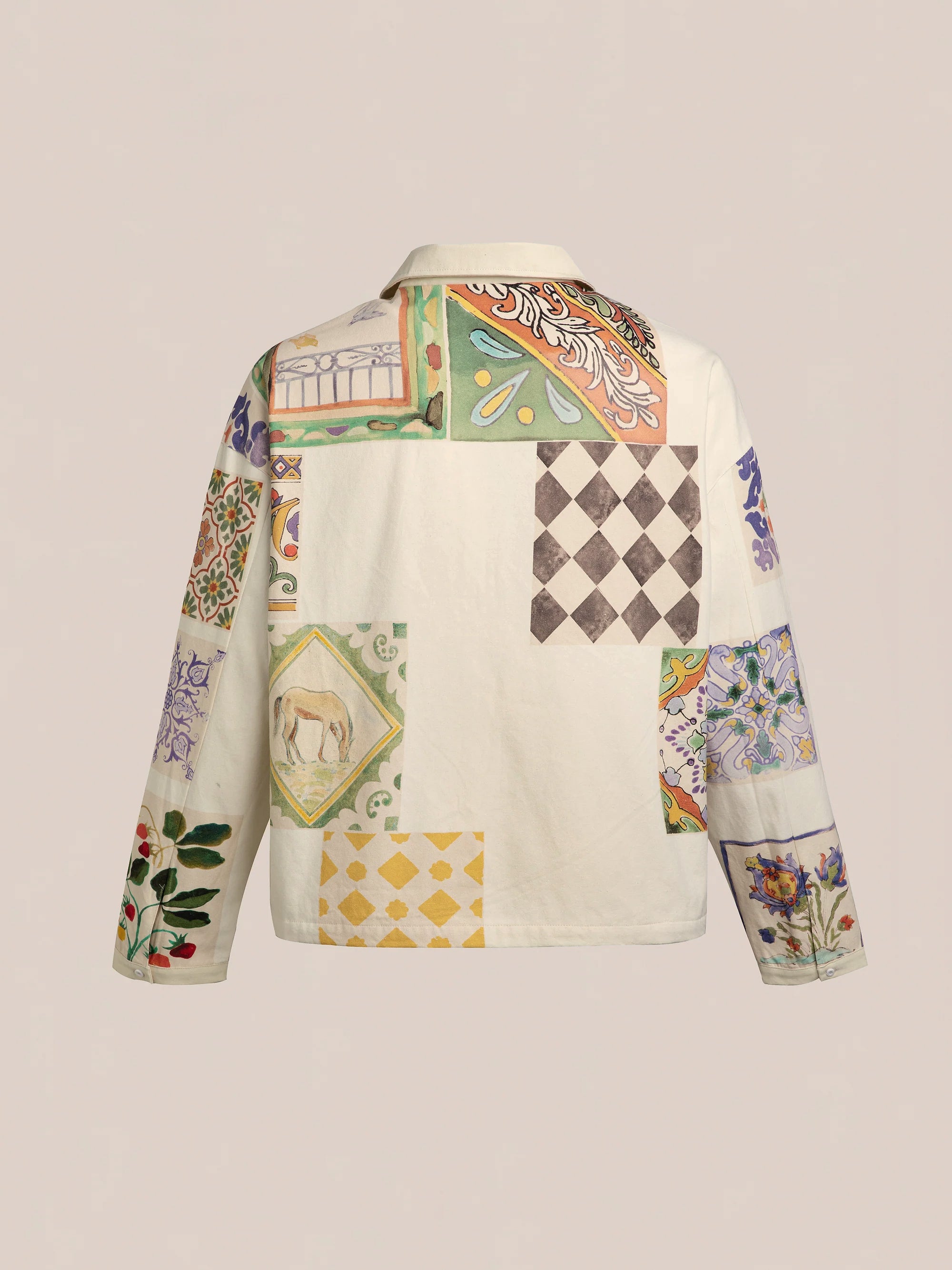 Introducing the Mosaic Work Jacket by FOUND, featuring a unique patchwork design on the back that includes Indo-Aryan patterns, florals, checkerboards, and geometric shapes. Made from light cotton canvas fabric, this jacket blends various colors and textures to create a distinctive appearance.