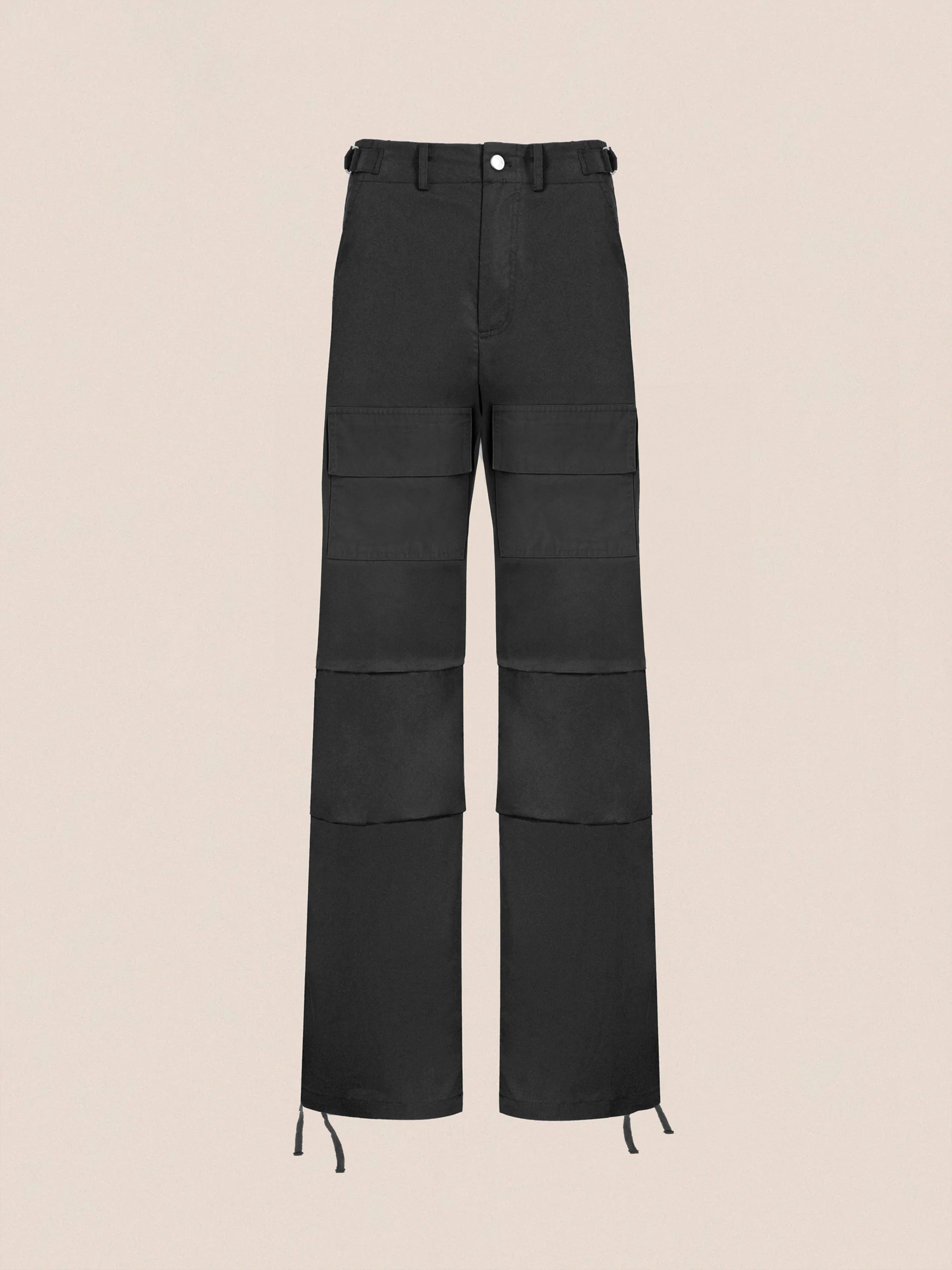 Found's Parachute Cargo Twill Pants, featuring an adjustable waist, wide legs, multiple pockets, and drawstrings at the hems, are displayed against a plain background.