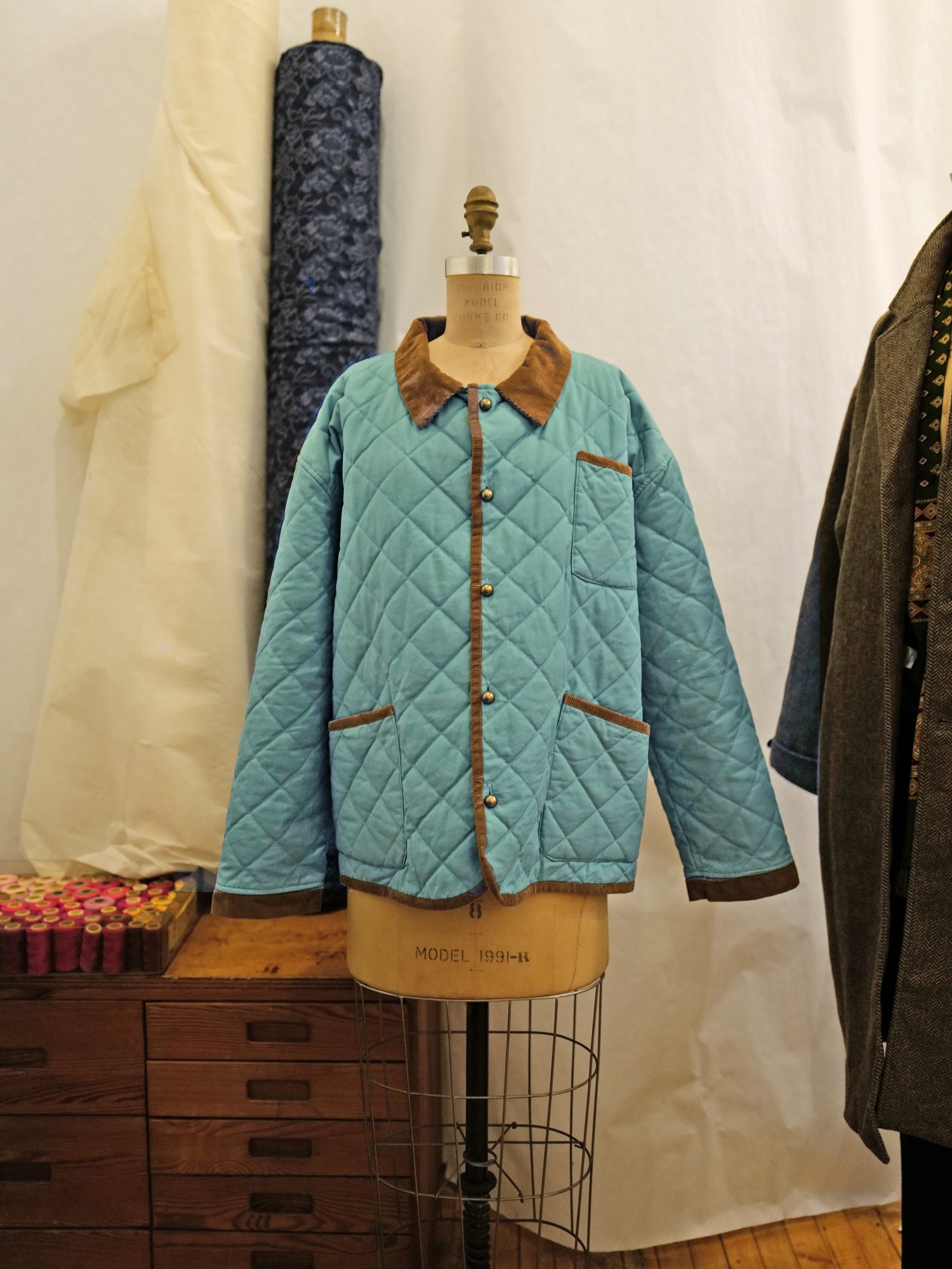 A Found Kashmir Meadow Quilt Jacket made of corduroy on a mannequin.