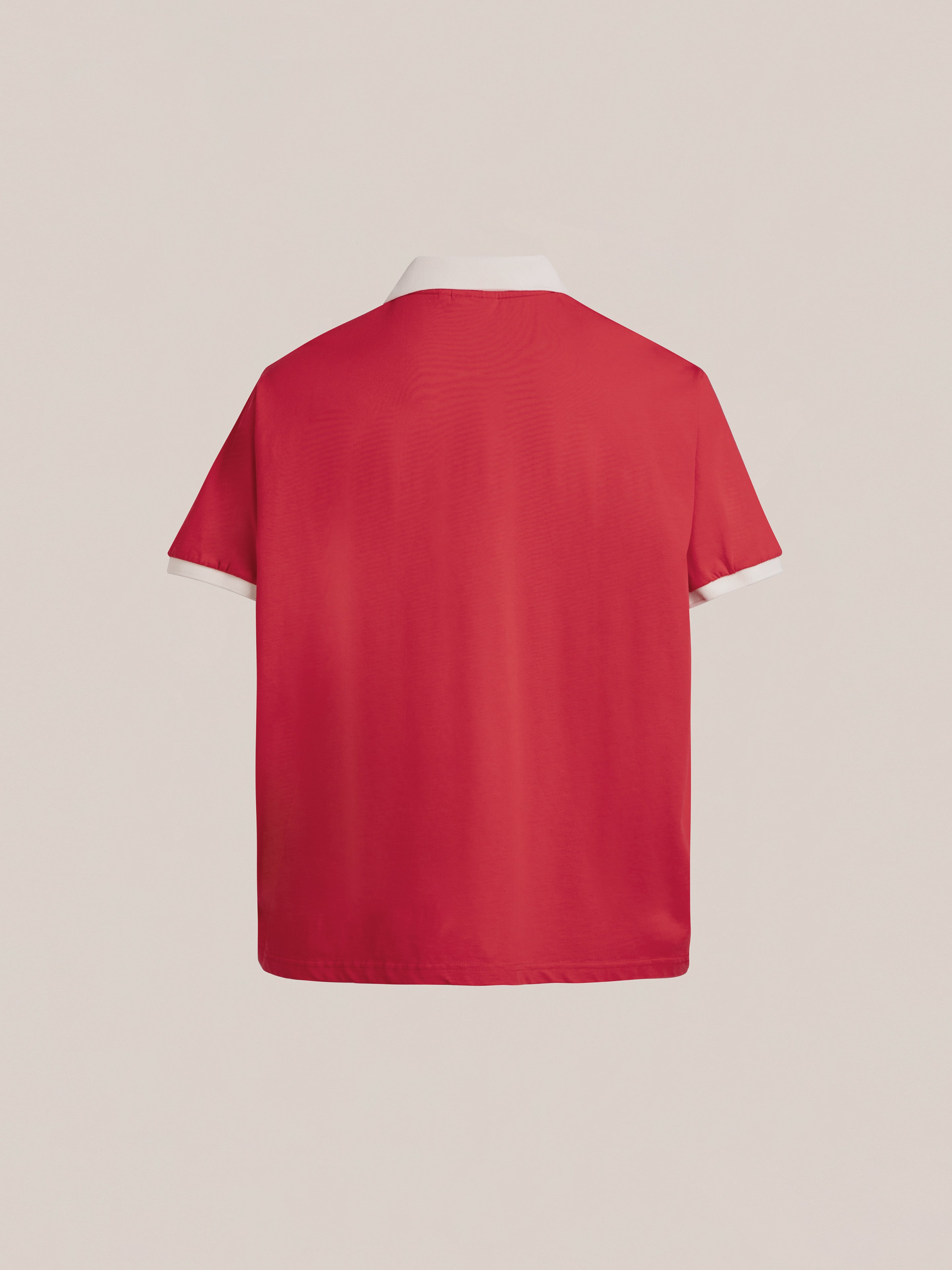 The Goji Red Jersey by FOUND combines a vintage athletic uniform-inspired design, captured from a back-facing perspective against a plain background. It is highlighted with contrasting yoke and collar details, along with white sleeve cuffs to give it an authentic sporty appearance.